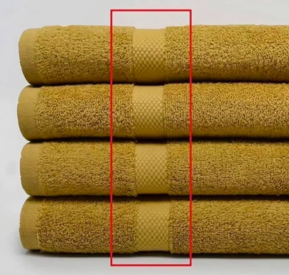 Kenapa Handuk Punya Garis Panjang di Ujungnya? Ini Jawabannya!